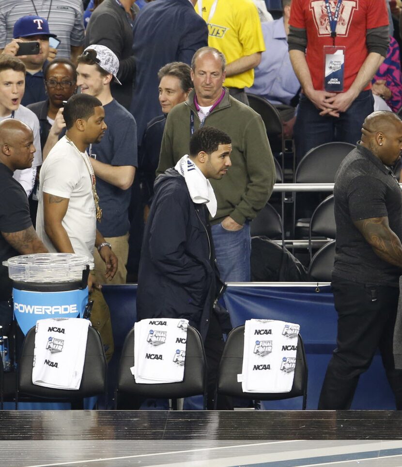 Apr 5, 2014; Arlington, TX, USA; Recording artist Drake in attendance in the game between...