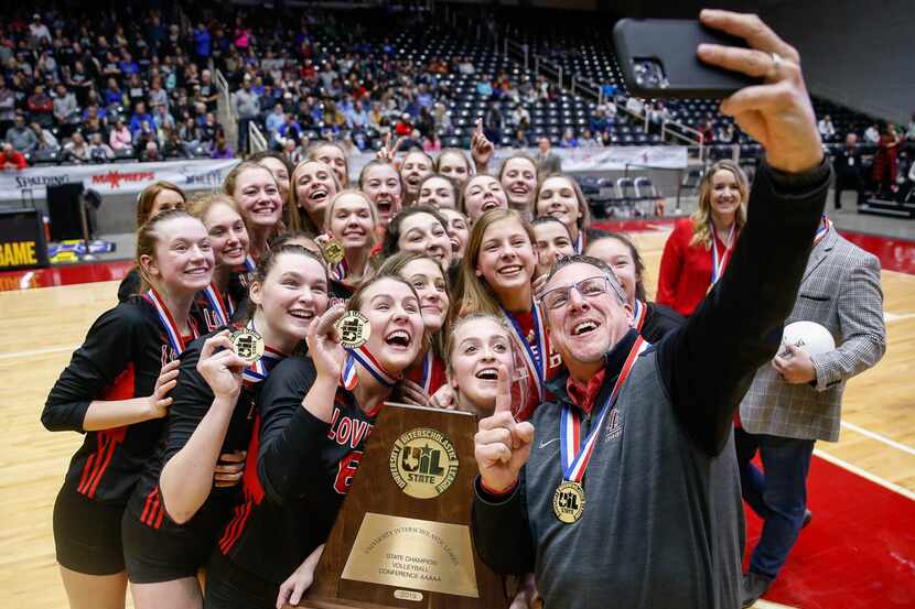 The Lovejoy volleyball team poses for a selfie after winning the Class 5A state championship...