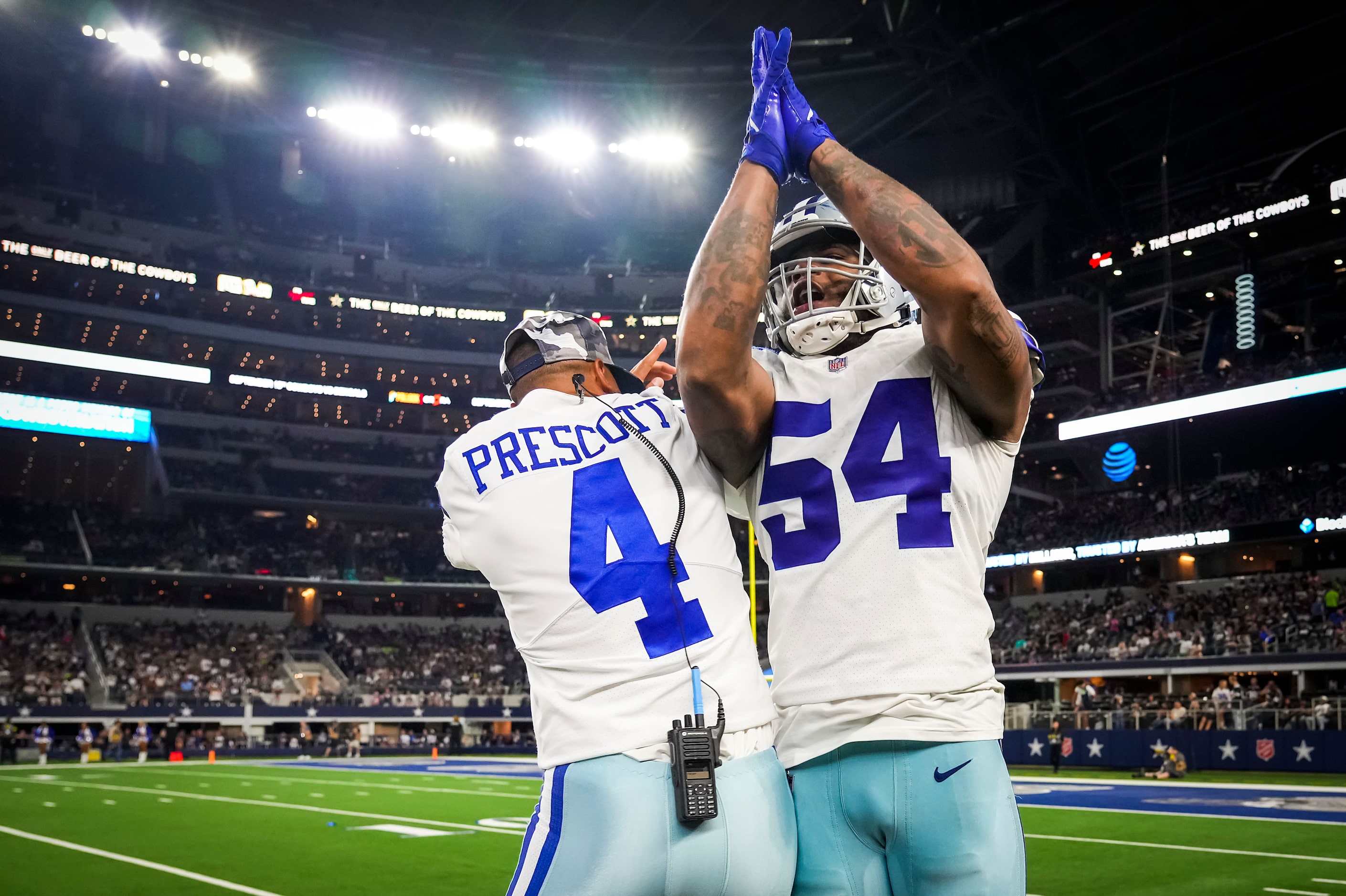 Dallas Cowboys defensive end Sam Williams (54) celebrates a Cowboys turnover with...