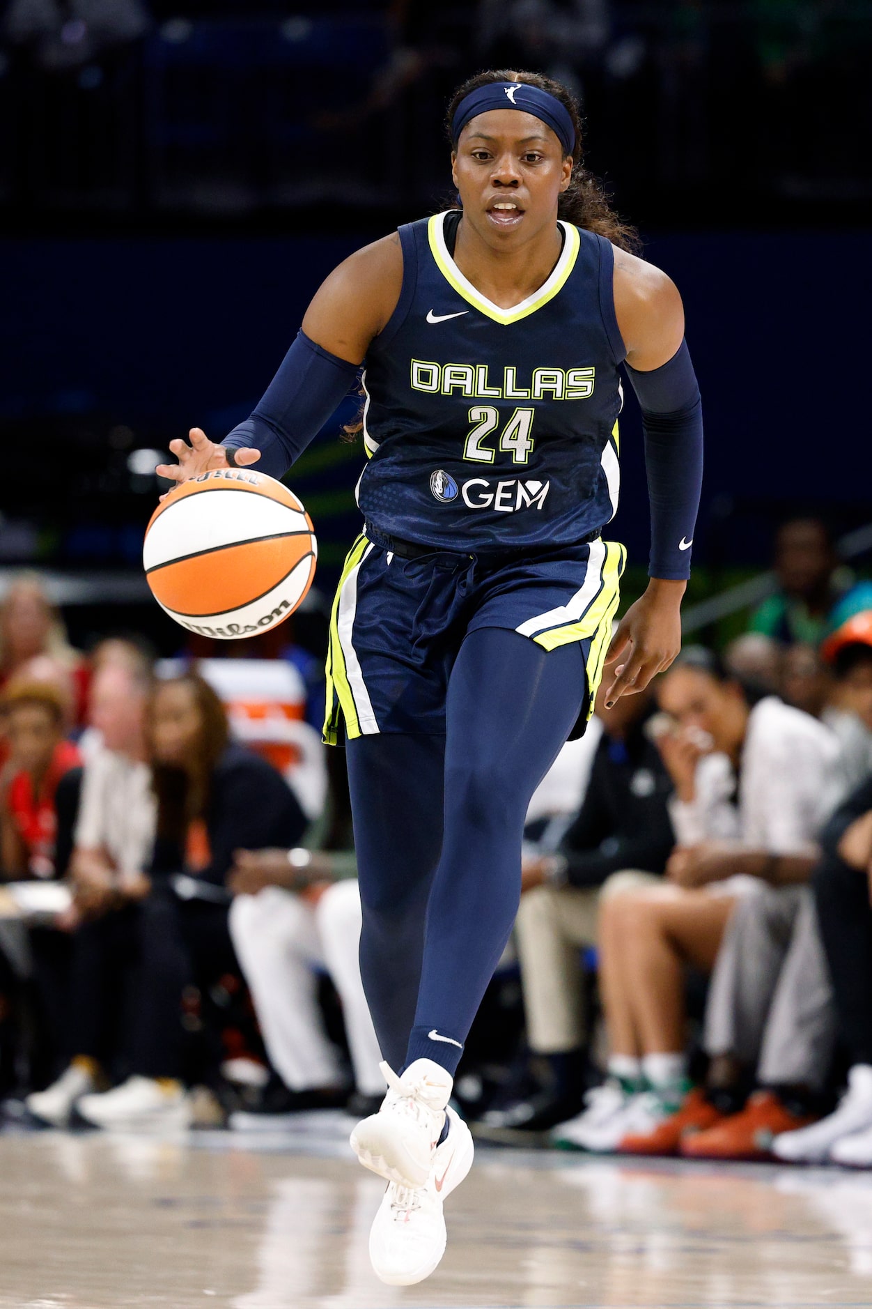 Dallas Wings guard Arike Ogunbowale (24) dribbles the ball up court during the second half...