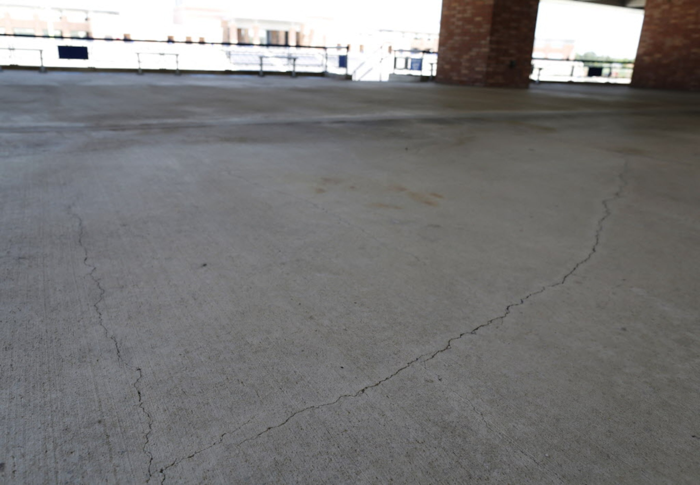 Some of the many cracks can be seen in this photo at Eagle Stadium in Allen, Texas on May...