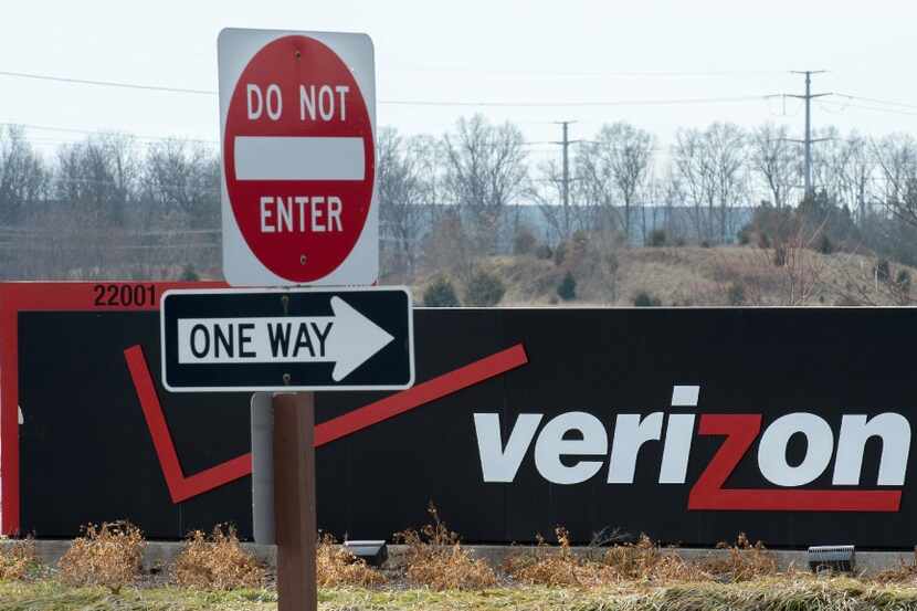 This file photo taken on January 2, 2015 shows the Verizon logo at the headquarters for...