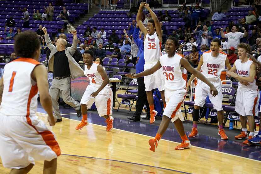 The Arlington Bowie bench reacts to beating the Hebron Hawks in the second half of the Class...