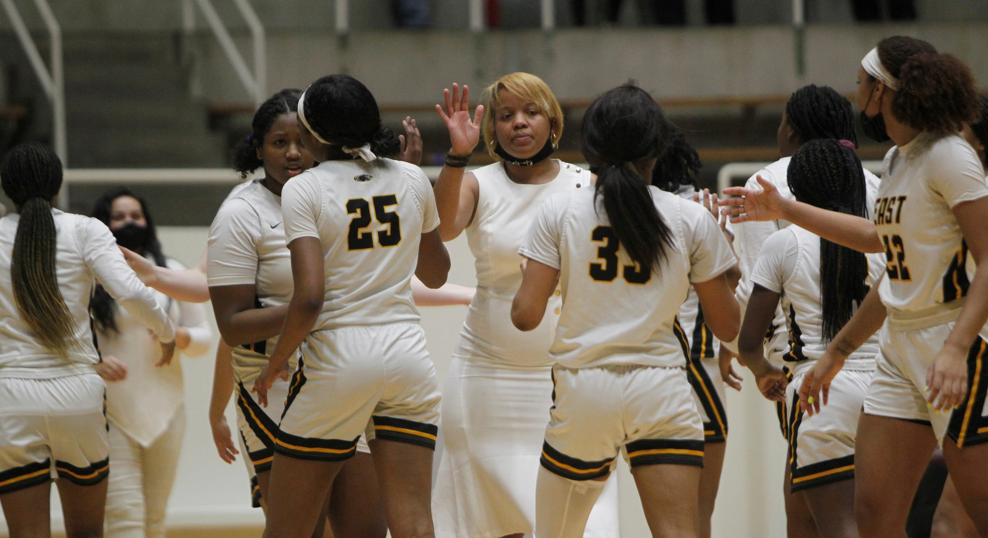 Plano East head coach Jessica Linson, center, welcomes her players to the bench area during...