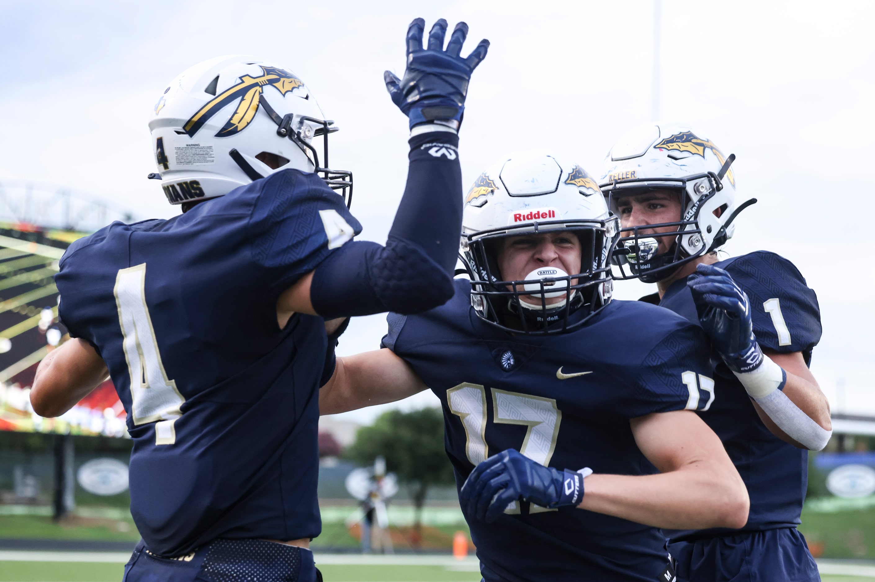 Keller High School Cole Leiker (17) cheers after tackling  Plano West Senior High Gael...