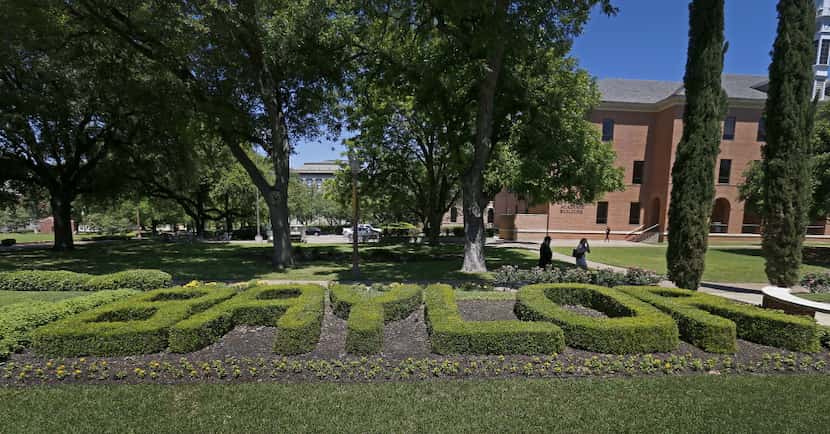 People walk near Pat Neff Hall on the Baylor University campus in Waco. (Jae S. Lee/Staff...