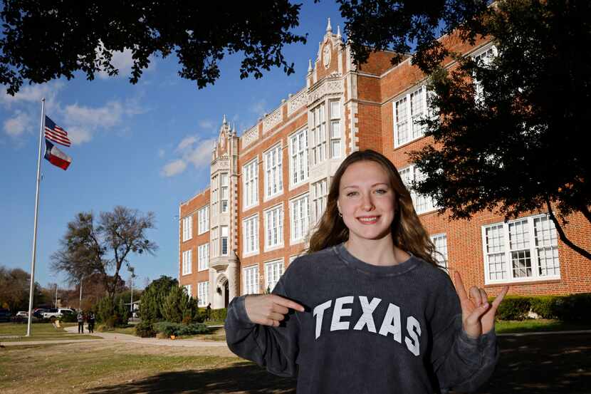 Woodrow Wilson High School senior Campbell Chase, a swimmer, poses for a photo in front of...