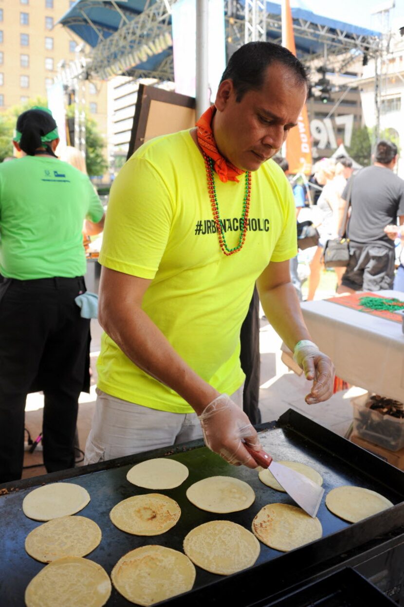 Tortillas cook on the grill at Urban Taco at Taco Libre at Main Street Garden in Dallas, TX...