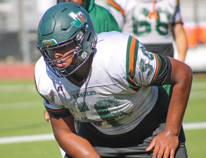 Garland Naaman Forest defensive lineman Markis Deal, a four-star recruit, holds scholarship...