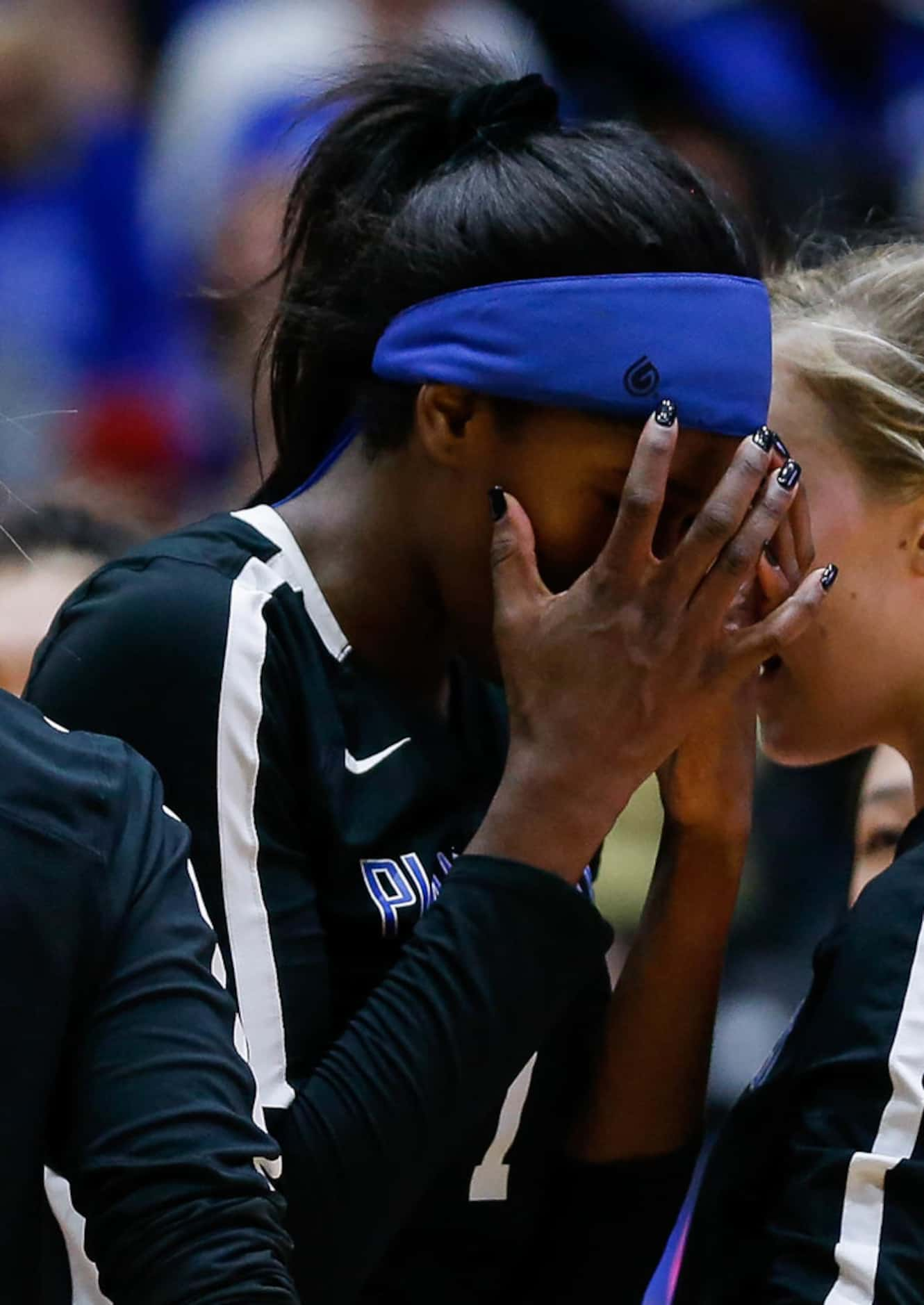 Plano WestÃs Iman Ndiaye (1) reacts to falling behind in the fifth and final set of a class...