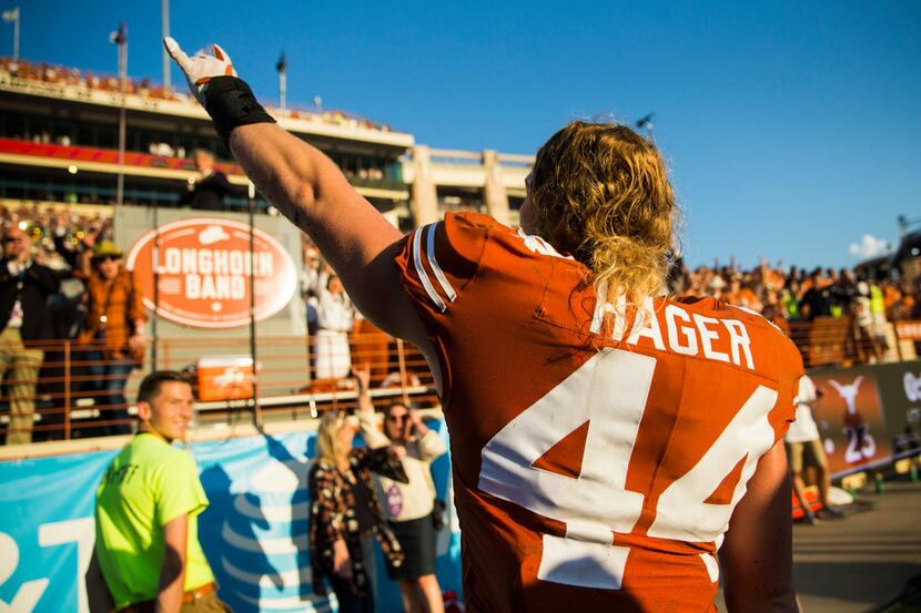 Texas Longhorns defensive lineman Breckyn Hager (44) celebrates a 23-17 win over the Baylor...