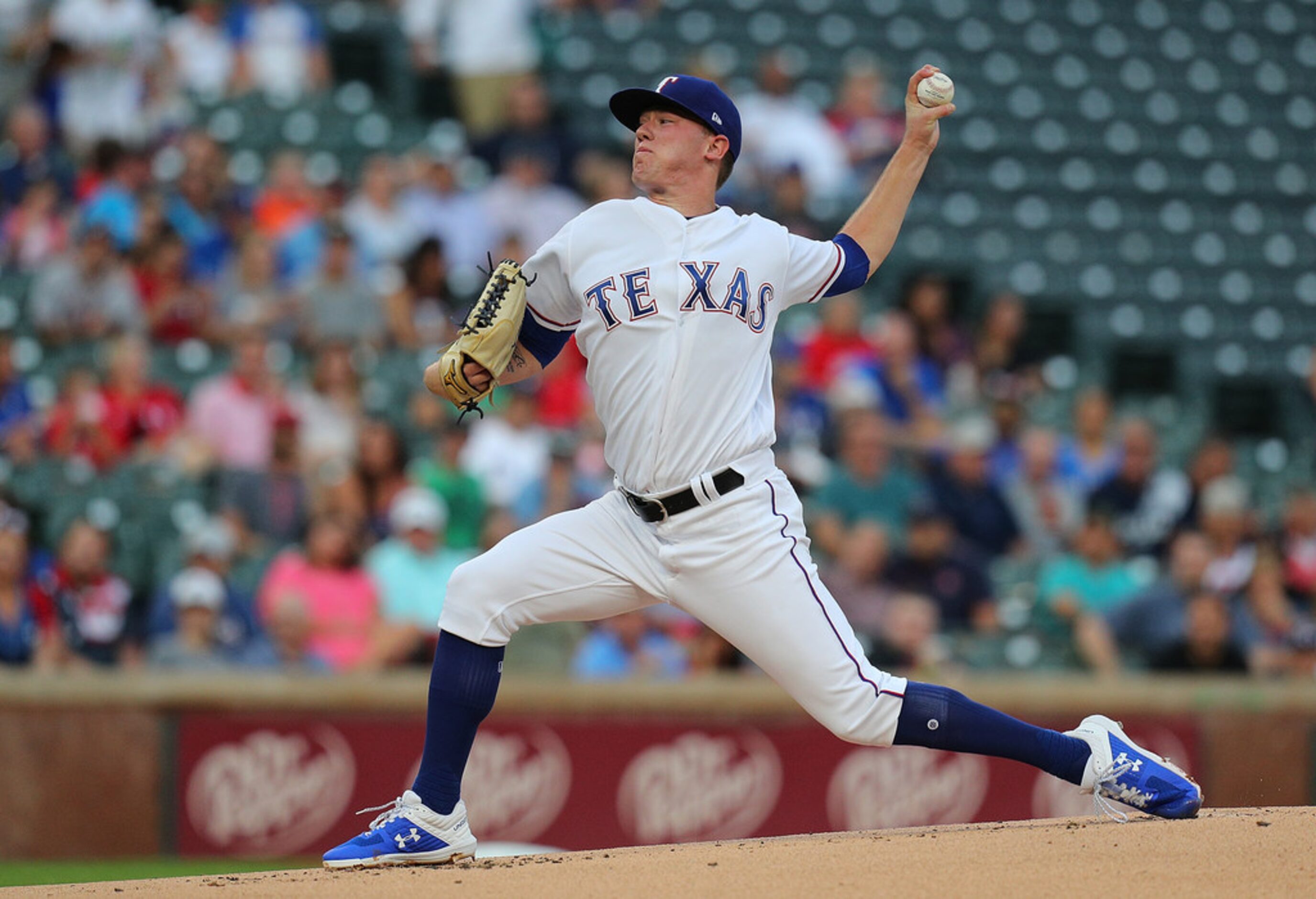 ARLINGTON, TEXAS - AUGUST 30: Kolby Allard #39 of the Texas Rangers delivers a pitch against...