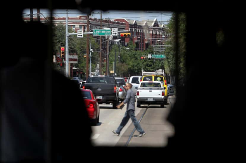 The view of upcoming Lemon Ave. as seen from inside the McKinney Avenue Trolley in Dallas,...