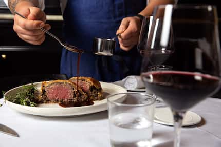 Dakota's executive chef and partner Ji Kang put a Beef Wellington on the menu when the...