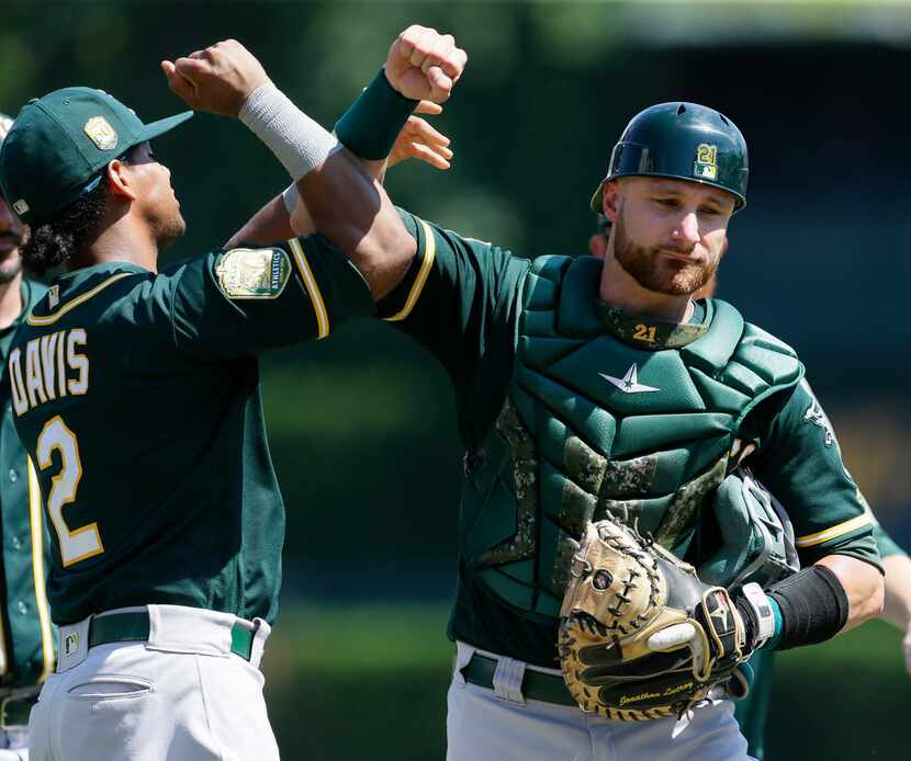 DETROIT, MI - JUNE 28:  Khris Davis #2 of the Oakland Athletics celebrates a 4-2 win over...