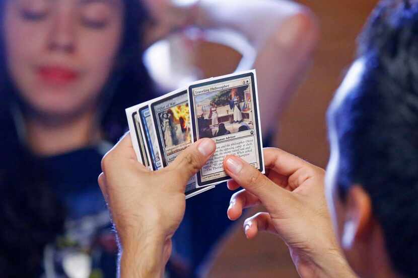 
Alex Reyes figures out his next move at the Magic The Gathering Summer Camp held at the Red...