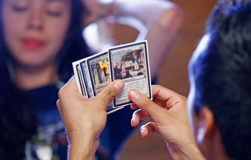 
Alex Reyes figures out his next move at the Magic The Gathering Summer Camp held at the Red...