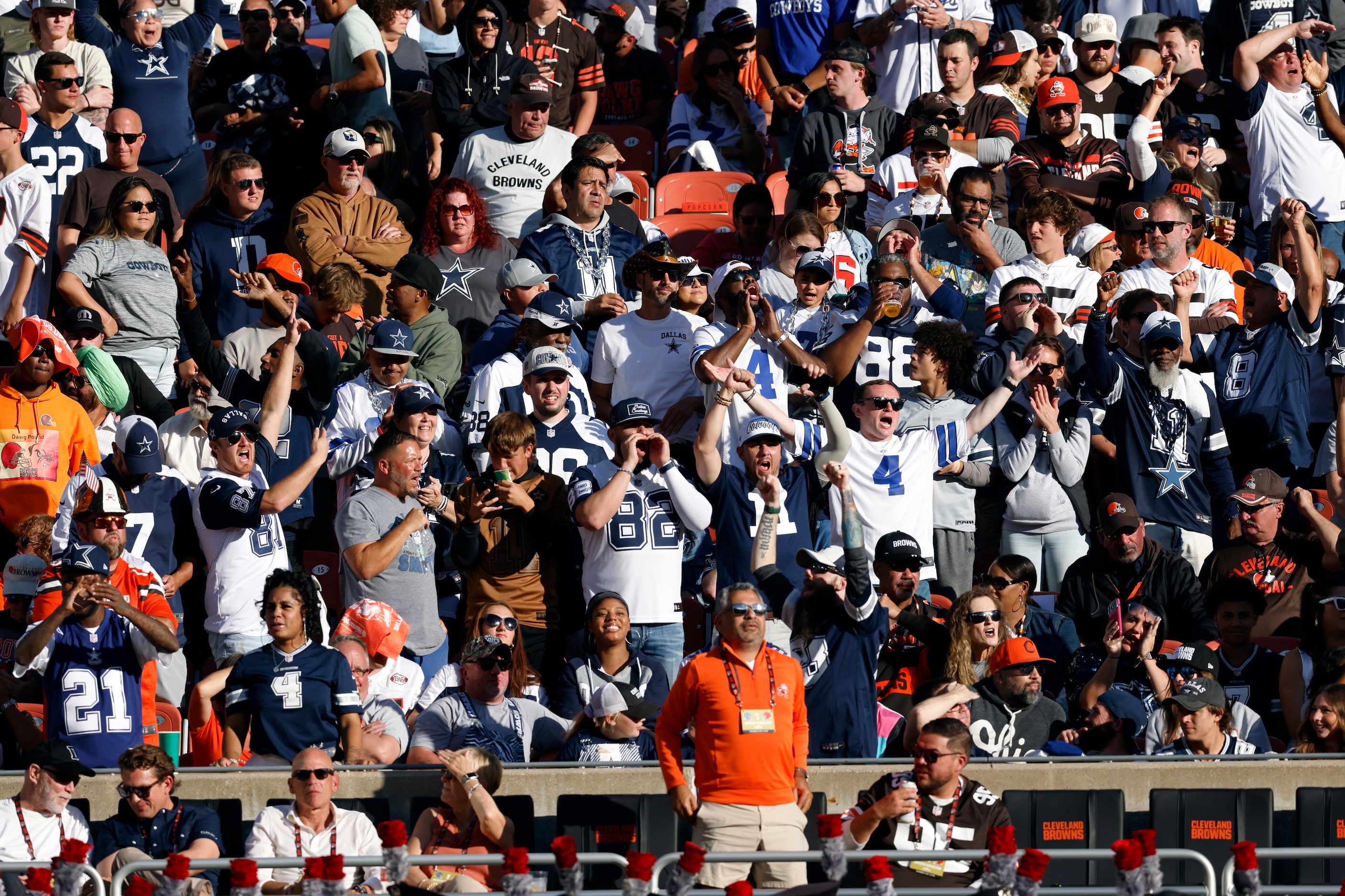 Dallas Cowboys fans cheer during the first half against the Cleveland Browns, Sunday, Sept....