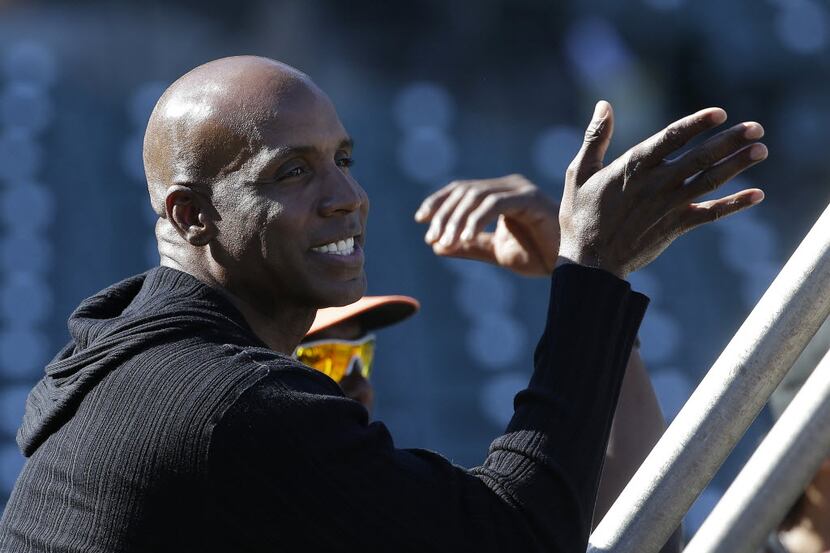 FILE - In this July 2015 photo, former baseball player Barry Bonds watches batting practice...