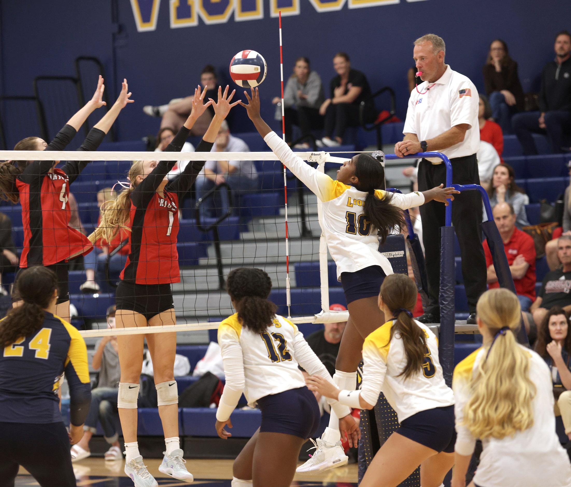 Ursuline player #1 Emma Sorensen and Prestonwood player #16 Taylor Clarke fight for the ball...