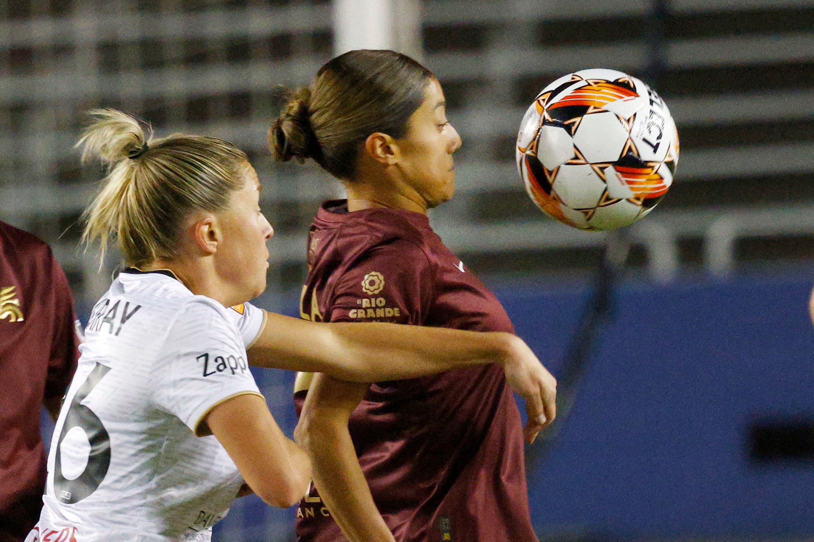 Spokane Zephyr midfielder  Katie Murray (26) and Dallas Trinity midfielder Samantha Meza...