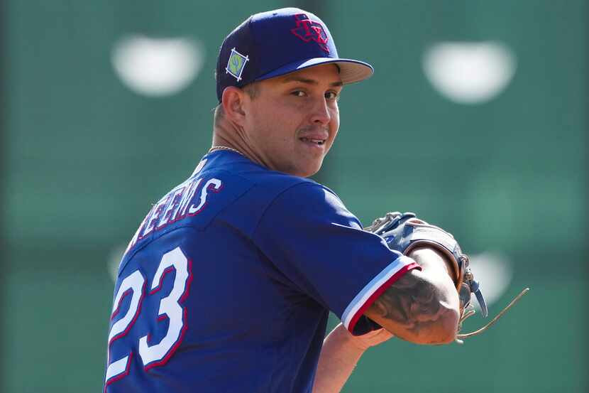 Pitcher Avery Weems participates in a drill during a Texas Rangers minor league spring camp...