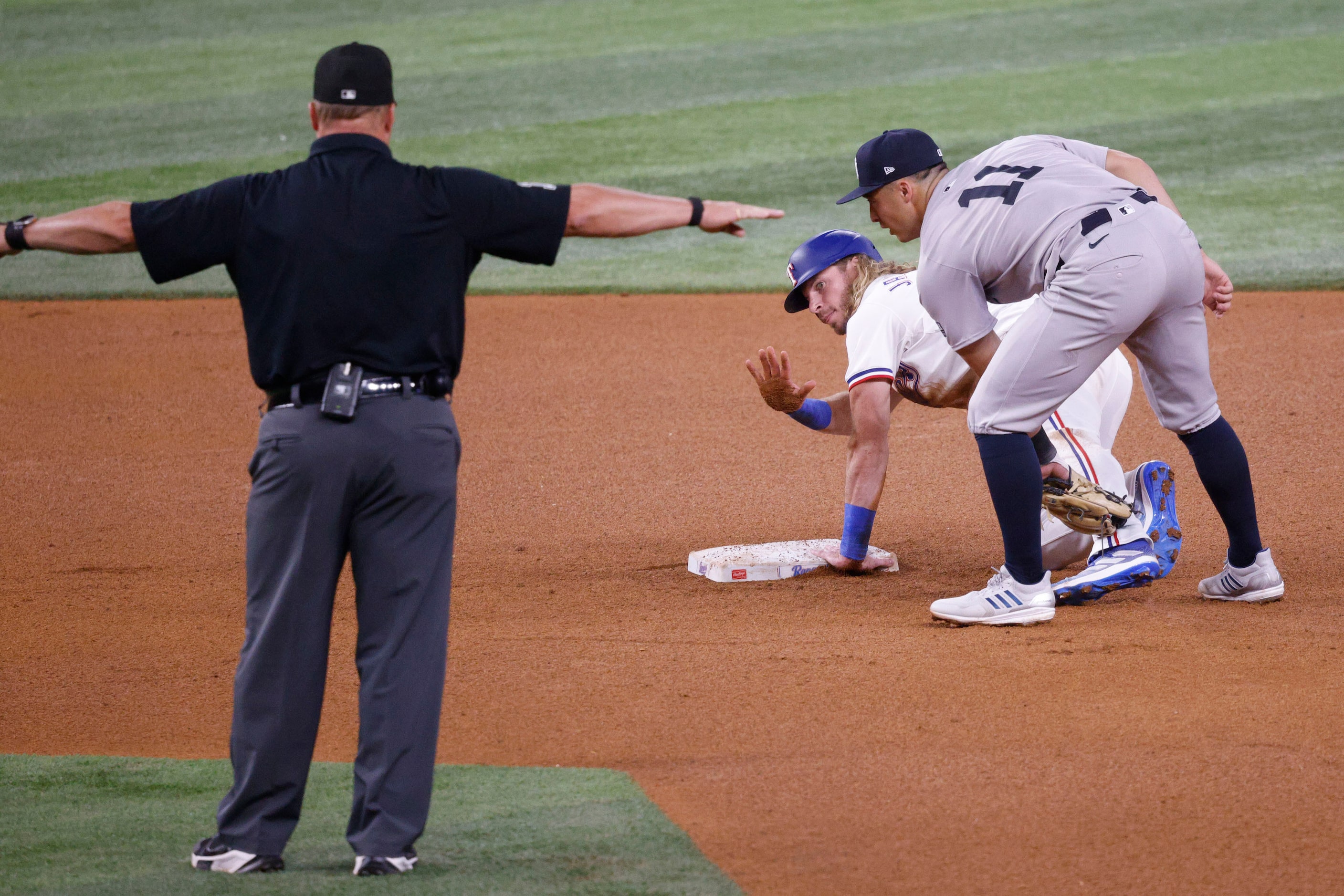 Texas Rangers outfielder Travis Jankowski (16) steals second base as New York Yankees...