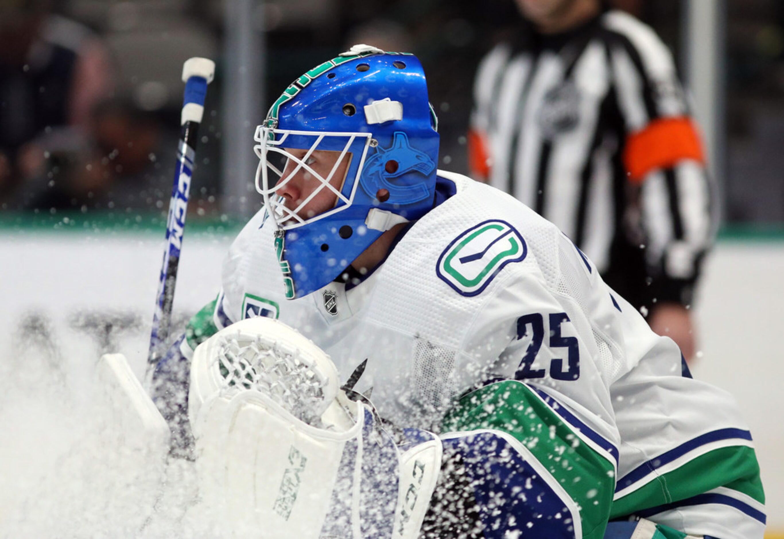 DALLAS, TEXAS - NOVEMBER 19:  Jacob Markstrom #25 of the Vancouver Canucks in goal against...