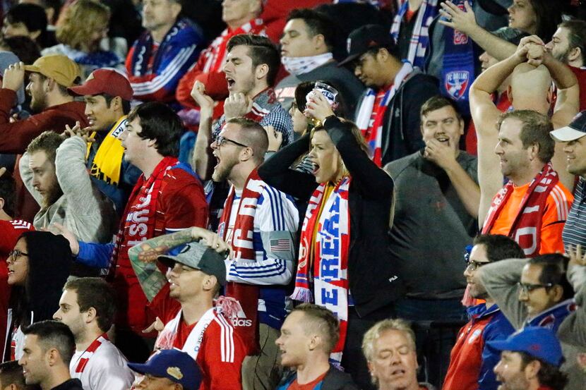 FC Dallas fans react to one of several missed goal opportunities during the second half as...