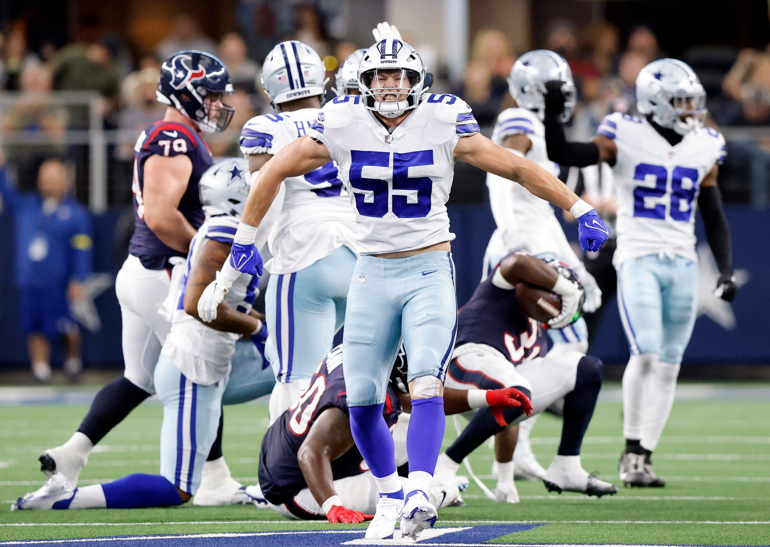 Dallas Cowboys linebacker Leighton Vander Esch (55) celebrates a third down stop of Houston...