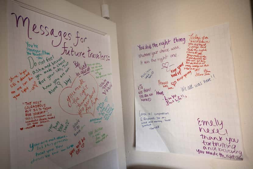 “Messages for future travelers” are posted on the wall of the New Mexico Religious Coalition...