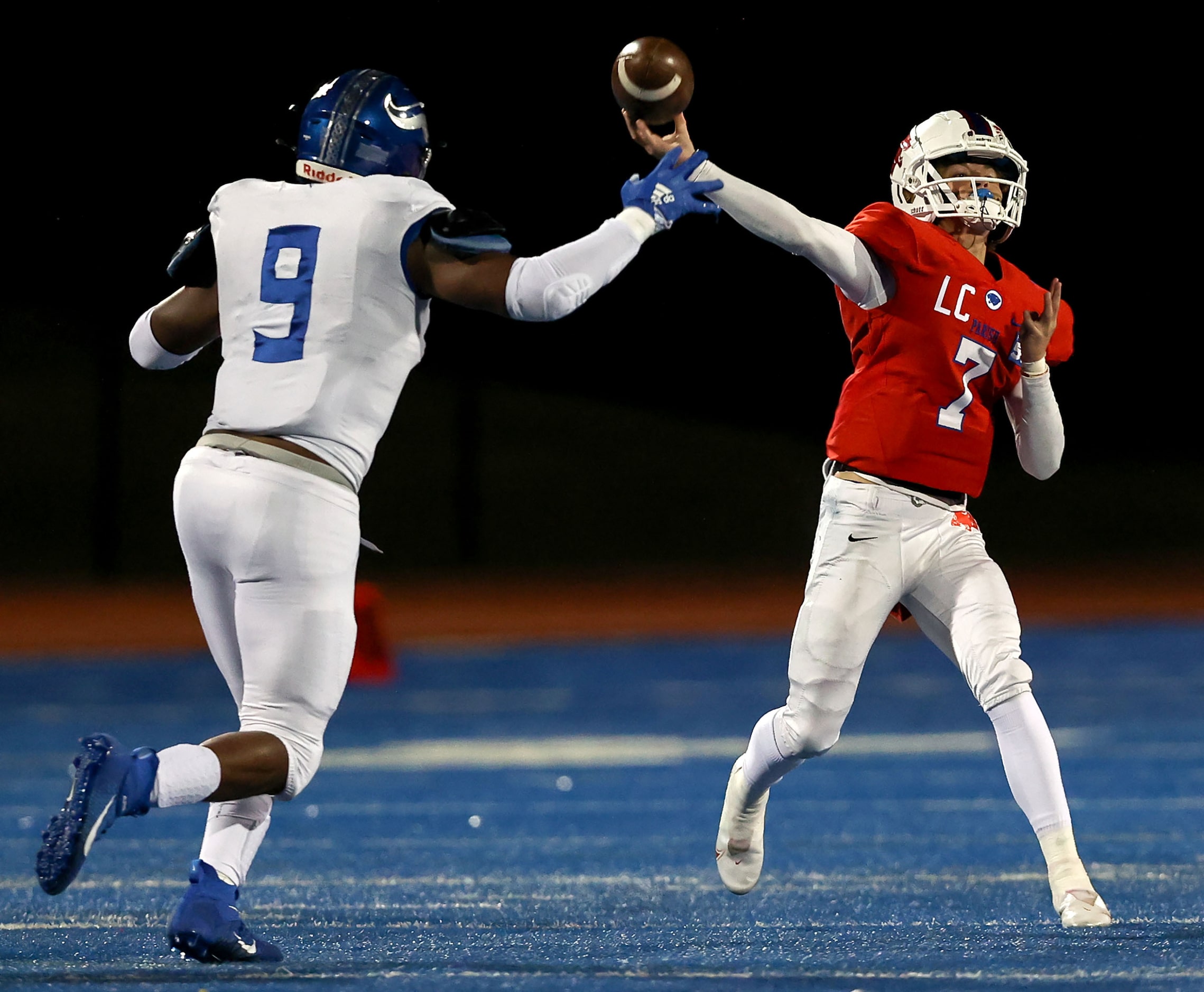 Parish quarterback Sawyer Anderson (7) gets off a pass attempt as he is pressured by...