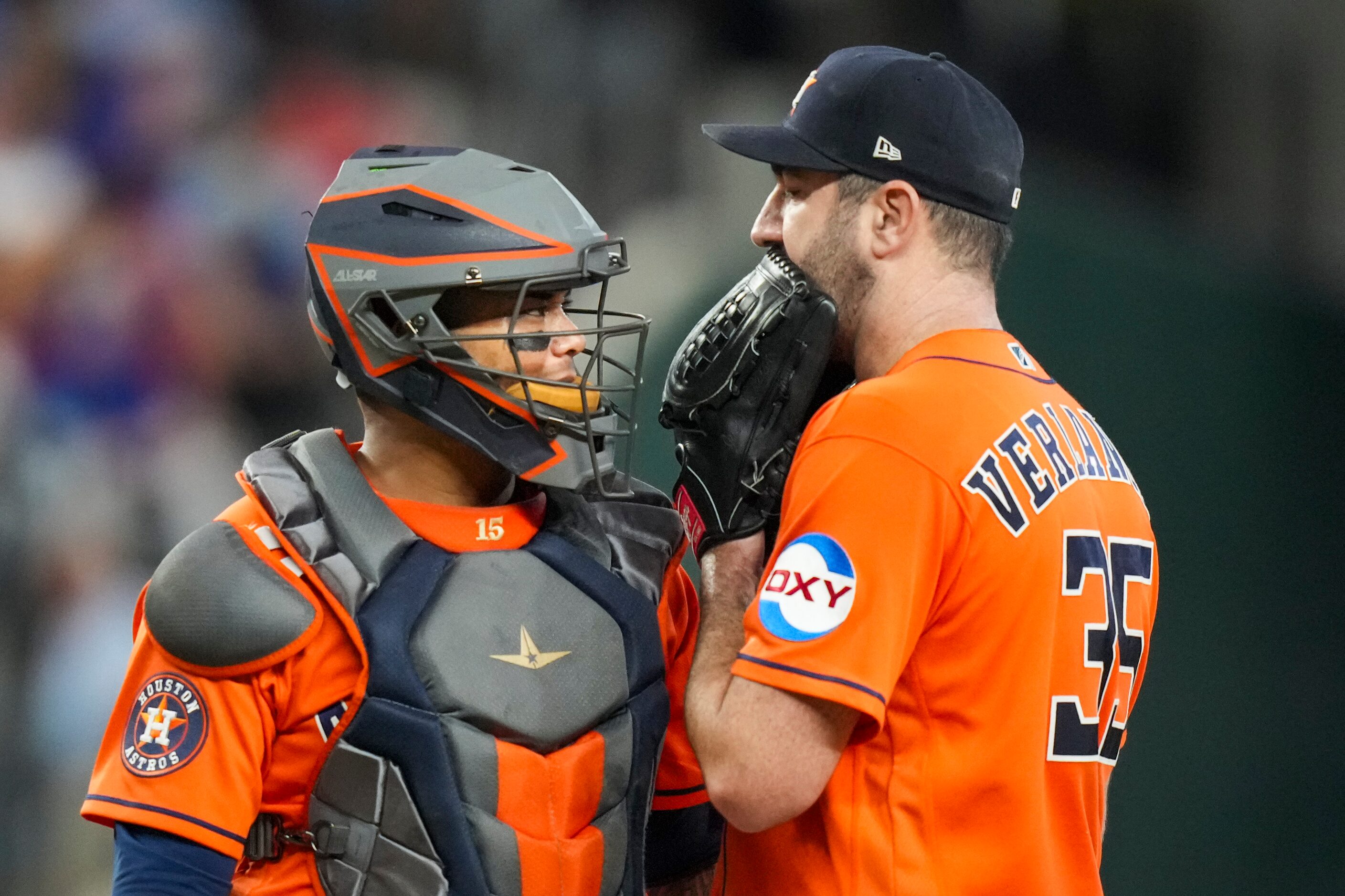 Houston Astros starting pitcher Justin Verlander gets a visit from catcher Martin Maldonado...