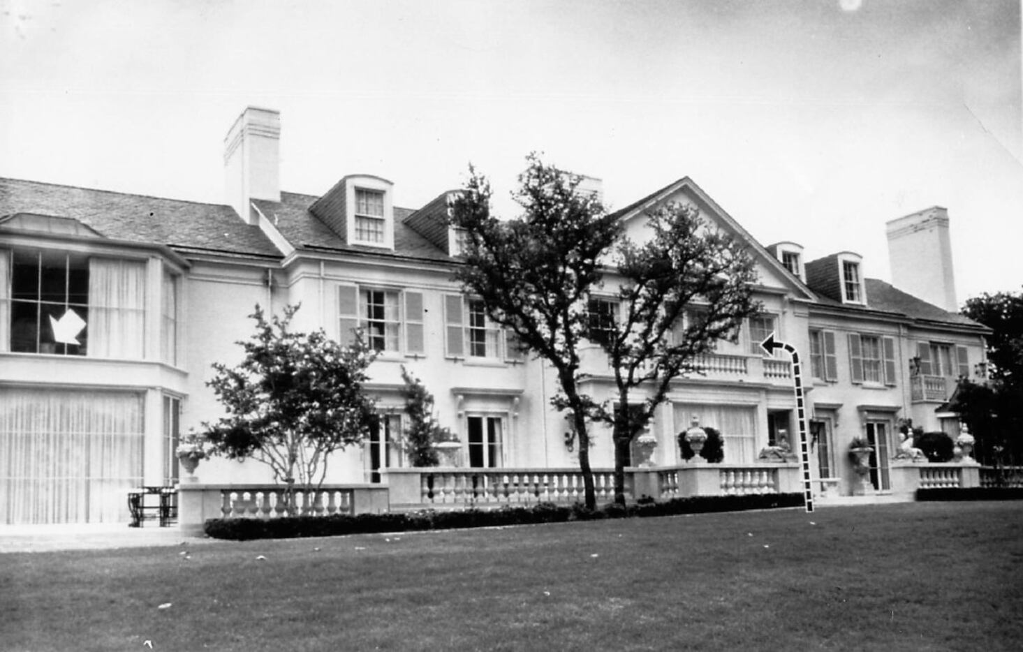 A 1963 photo of the Dallas mansion of James J. "Jim" Ling at 10300 Gaywood. The dotted line...