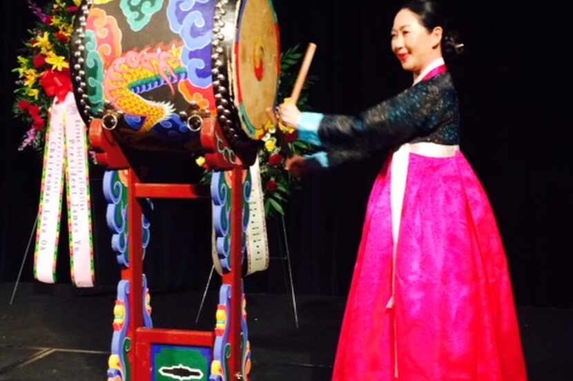 
A woman plays a Korean drum at the Greater Dallas Asian American Chamber’s board...