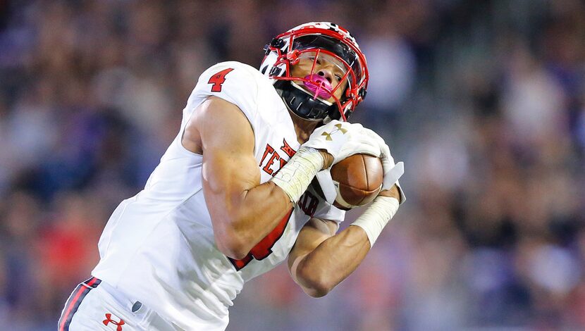 Texas Tech Red Raiders wide receiver Antoine Wesley (4) pulls in a second half pass along...