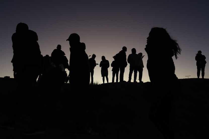 Migrants in the "Little Venezuela" camp along the Rio Grande banks in Ciudad Juárez, Mexico,...