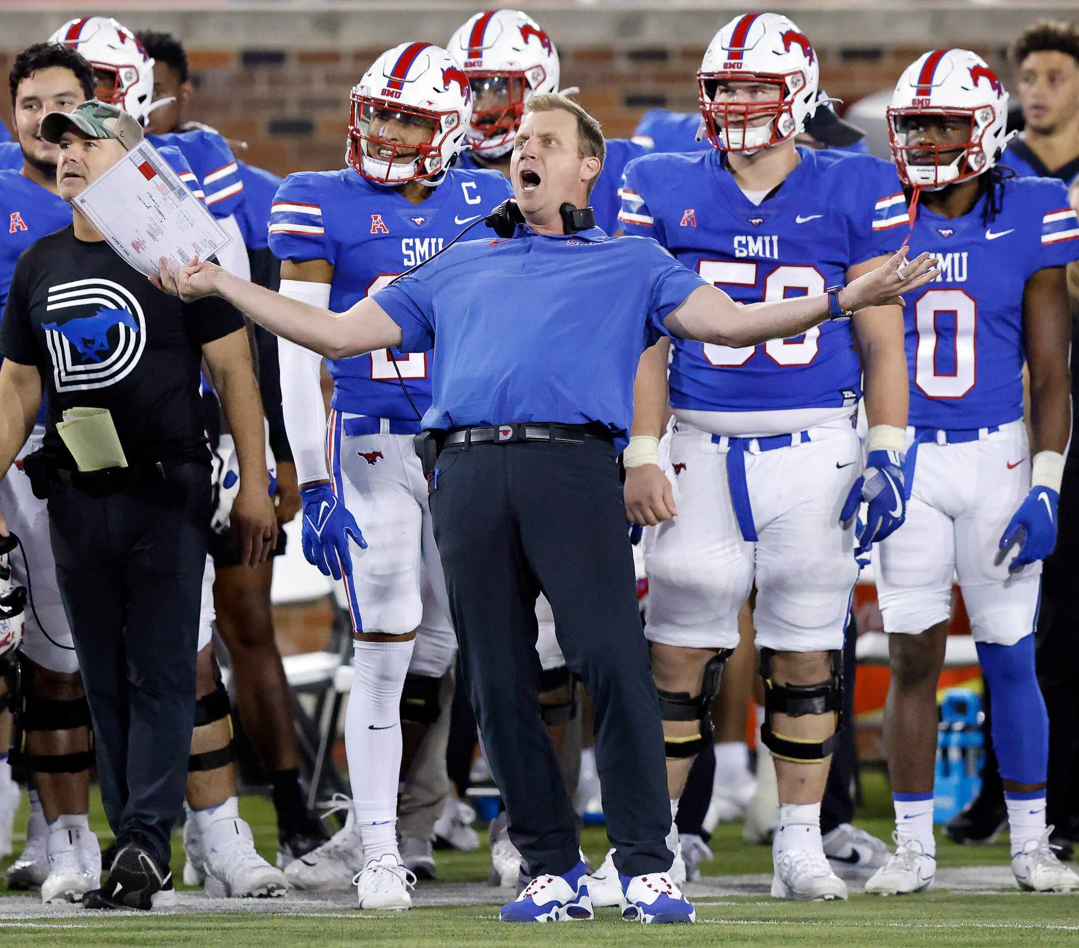 Southern Methodist Mustangs head coach Rhett Lashlee reacts after seeing the replay where...