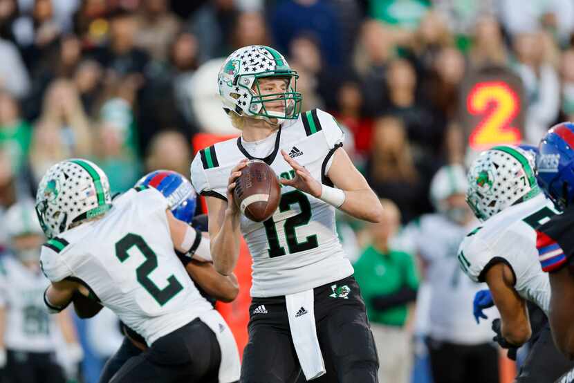 Southlake Carroll quarterback Kaden Anderson (12) looks to pass during the first half of...