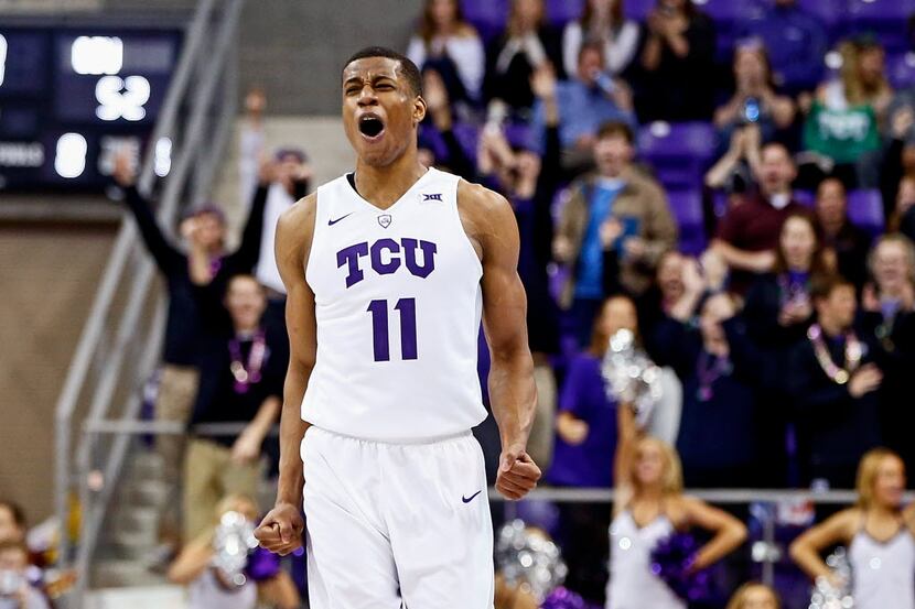 Feb 8, 2016; Fort Worth, TX, USA; TCU Horned Frogs guard Brandon Parrish (11) reacts after...