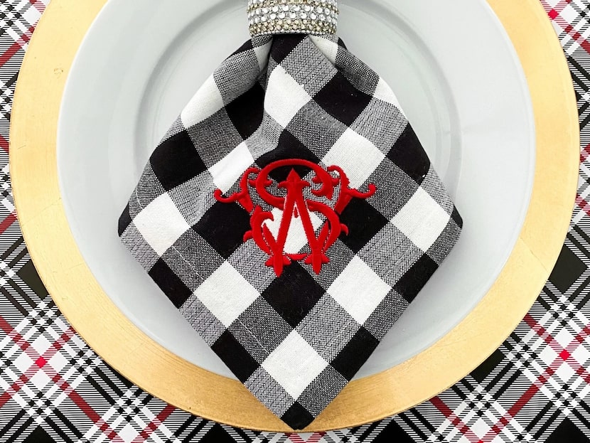 Black and white checked napkins with red monogram