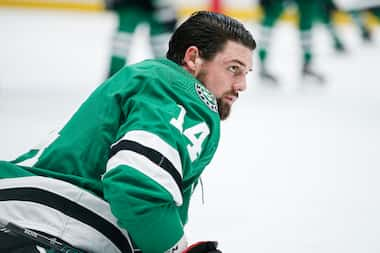 Dallas Stars forward Jamie Benn (14) looks on during warmups before an NHL hockey game...