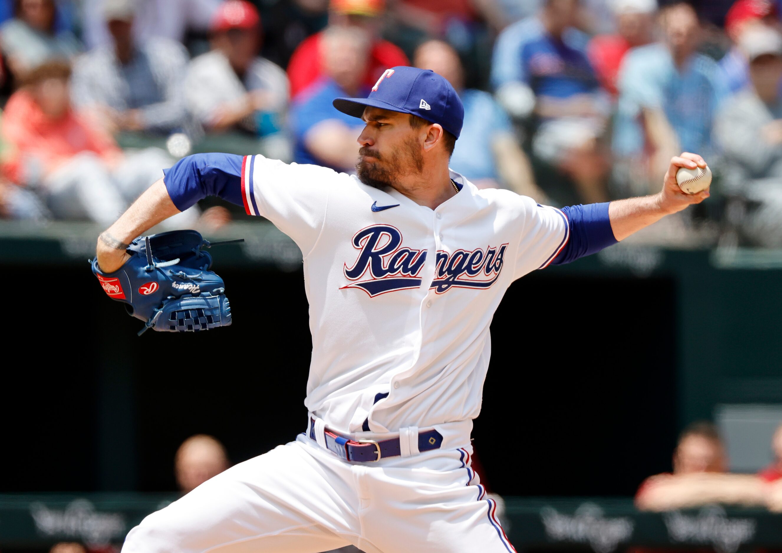 Texas Rangers starting pitcher Andrew Heaney (44) throws against the Arizona Diamondbacks...