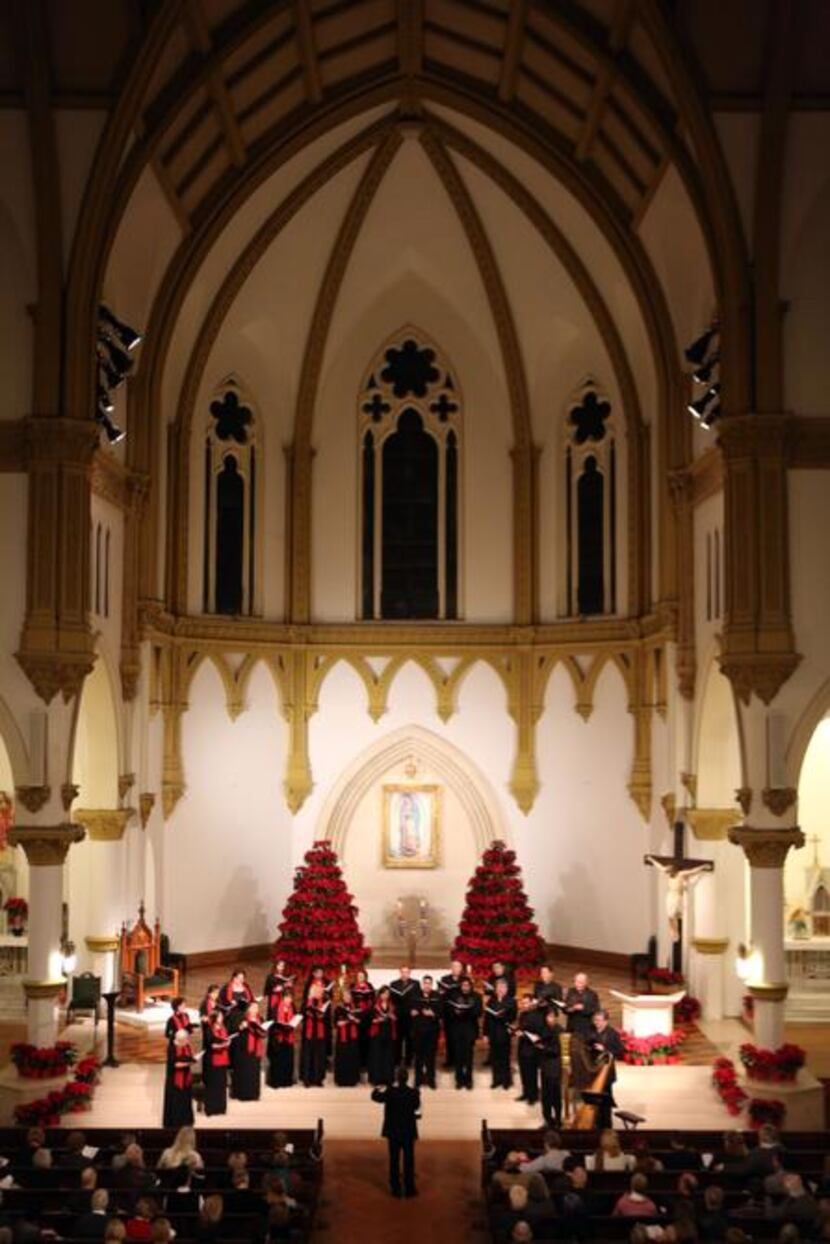 The Orpheus Chamber Singers perform Christmas by Candlelight at the Episcopal Church of the...