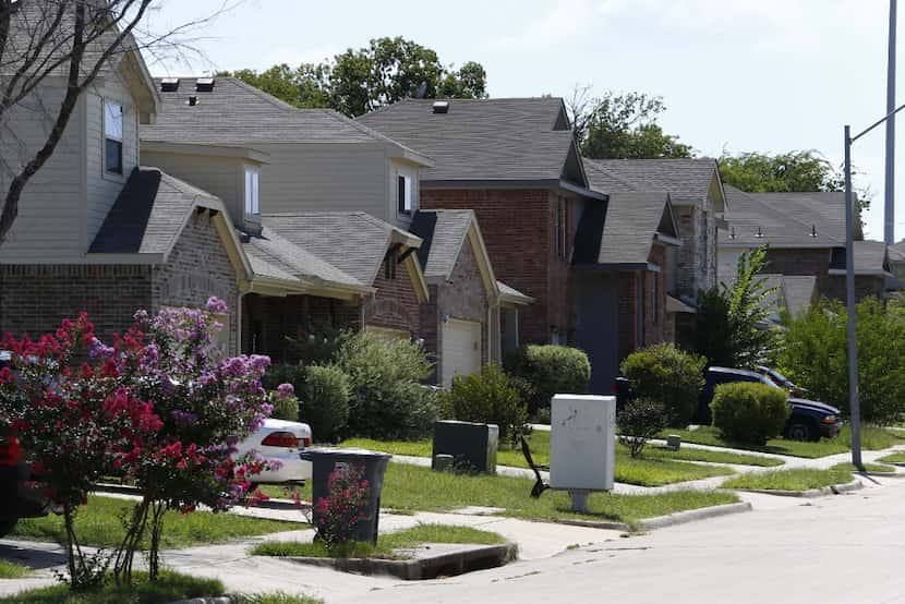 Homes in the Thornton Heights neighborhood on Cliff Heights Circle in Dallas.