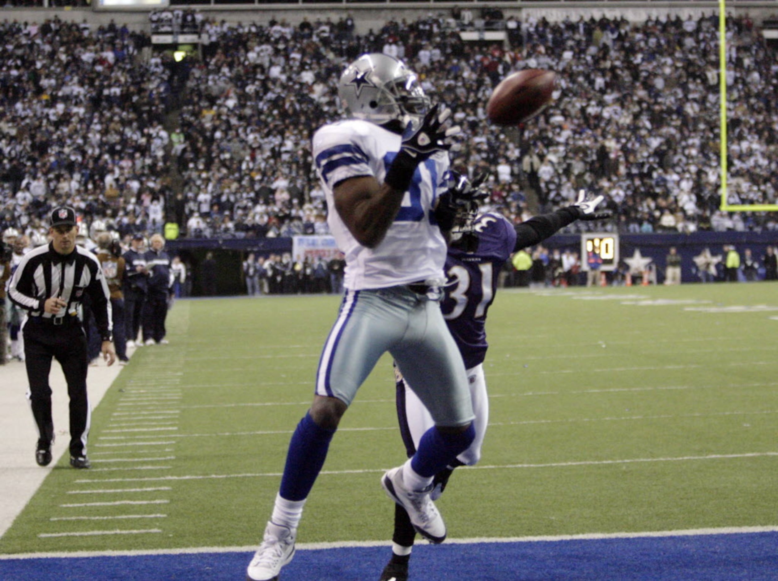 Terrell Owens #81 of the Dallas Cowboys in action during the