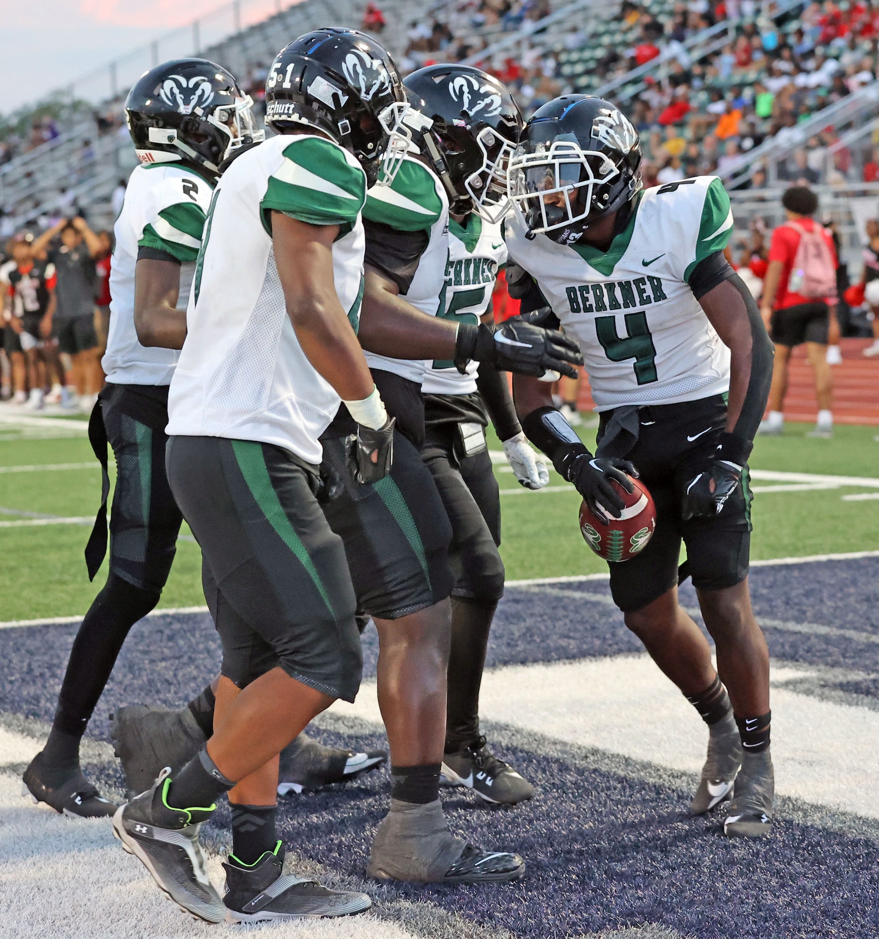 Richardson Berkner High RB Jaelyn Thomas (4) celebrates with teammates after scoring a...