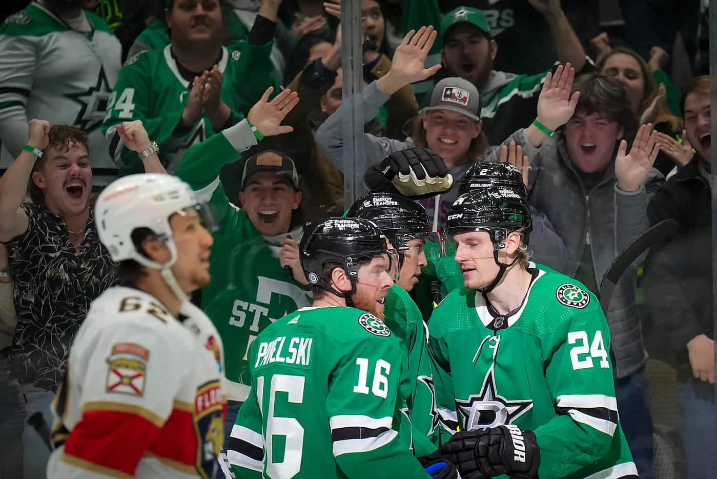 Dallas Stars left wing Jason Robertson (21) celebrates a goal with center Joe Pavelski (16)...