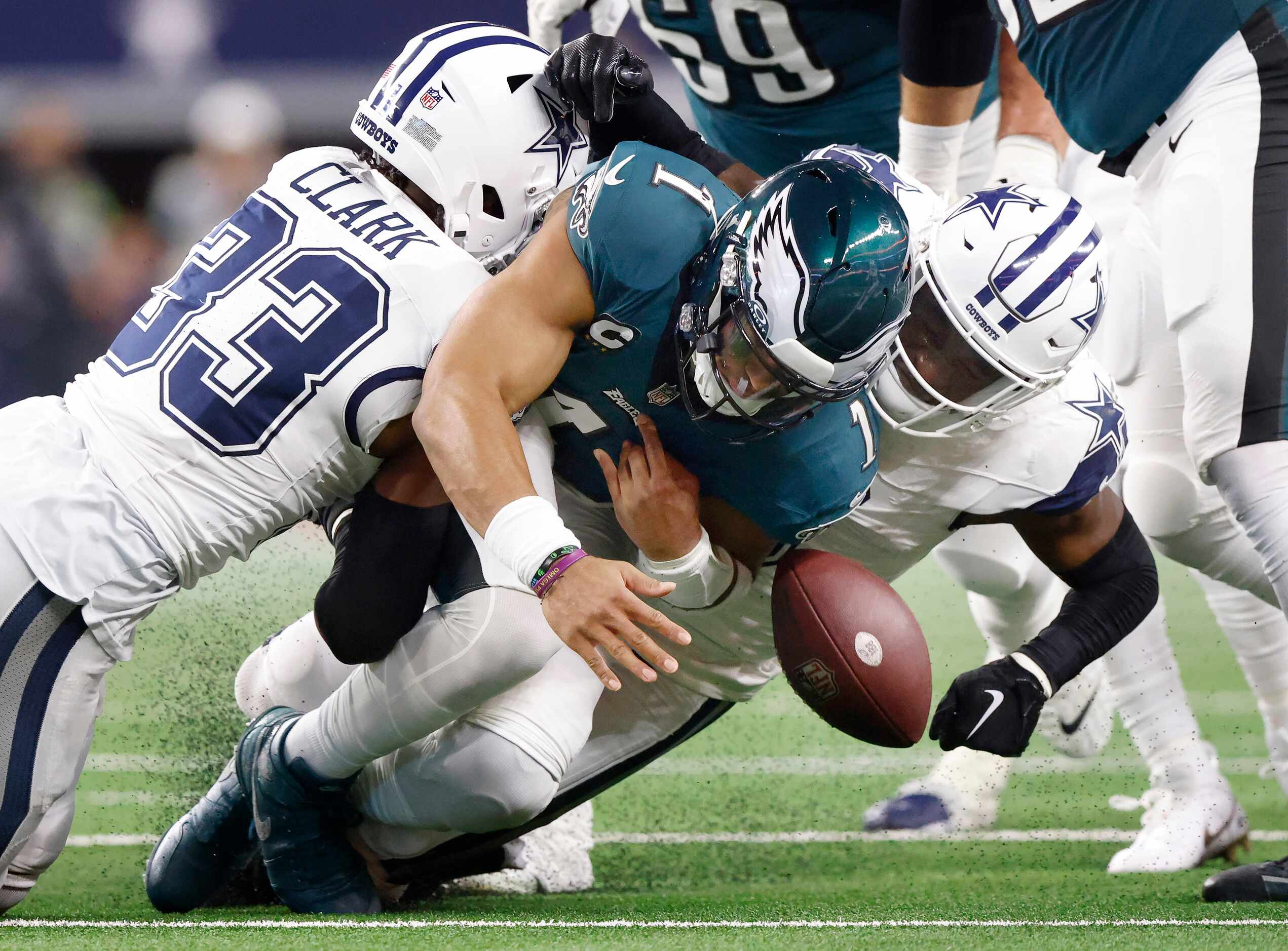 Dallas Cowboys safety Donovan Wilson (6) forces Philadelphia Eagles quarterback Jalen Hurts...