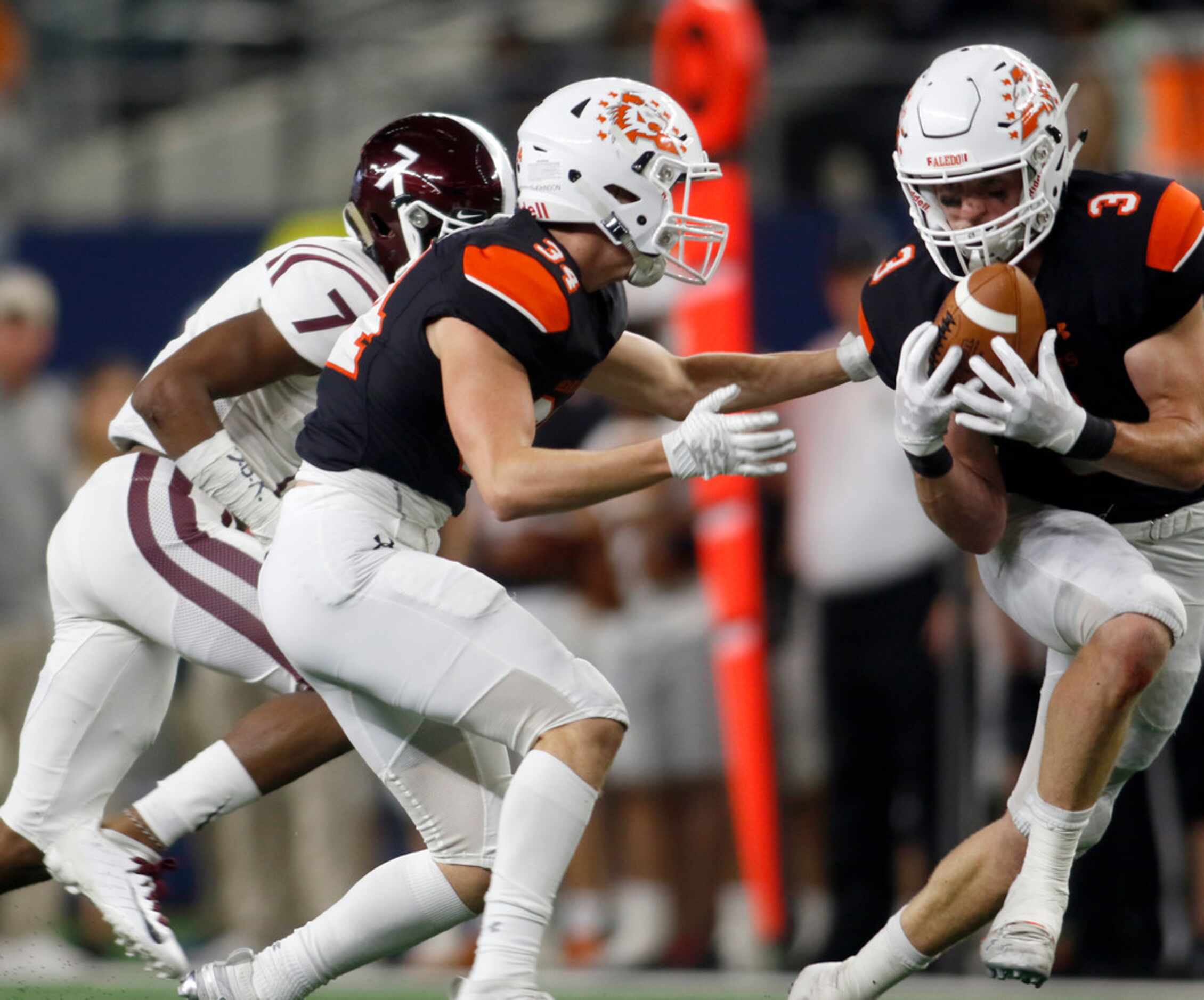 Aledo safety Nathan Fingar (3) comes up with an interception as teammate Collin Johnson (34)...